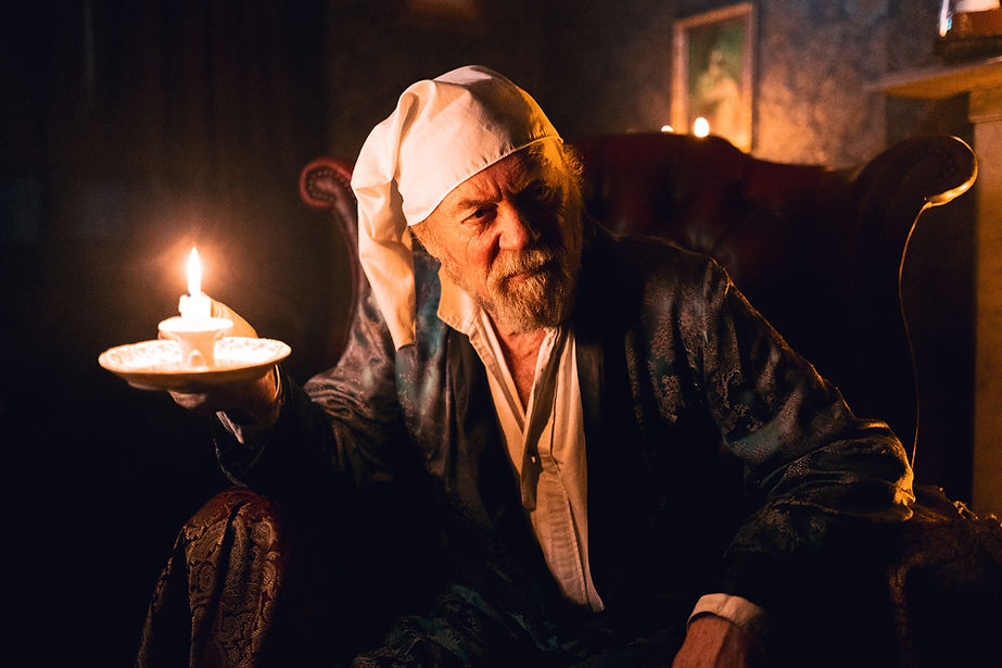 Scrooge played by Ken McConnell for GINIFICENTS production of A Christmas Carol at St Geor