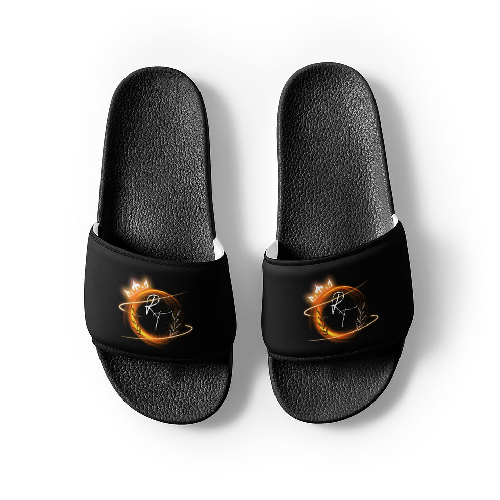 Pair of black slides with orange design. Rift Terra slides.