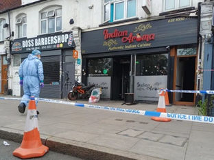 Jovem e homem detidos após incêndio em restaurante de Londres