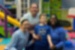 Child and three therapists at High Hopes location