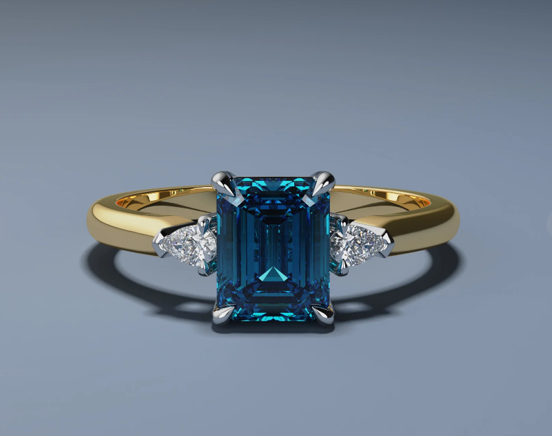 Emerald-cut blue sapphire and diamond ring