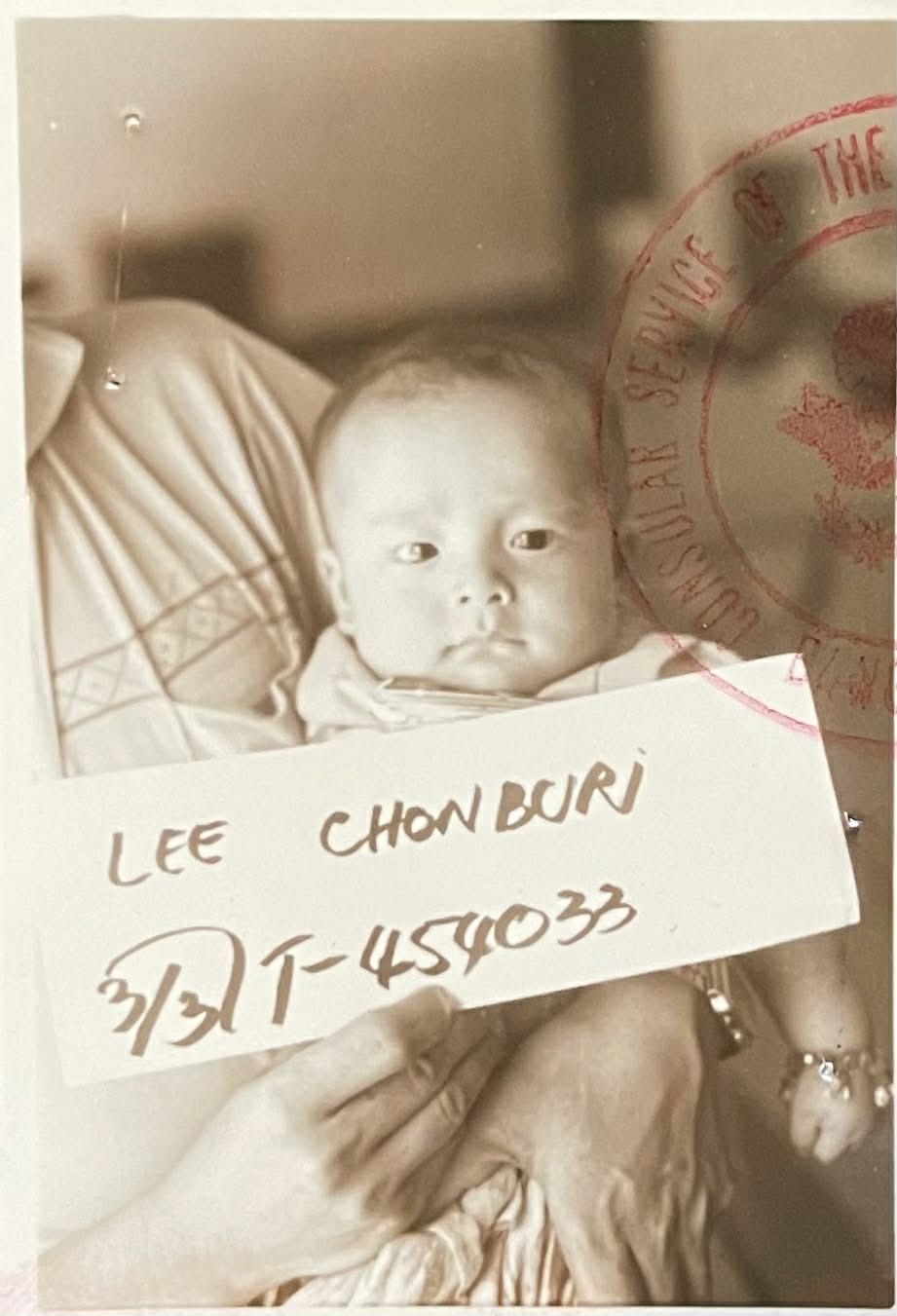Chonburi Lee as a baby arriving in the United States as a refugee