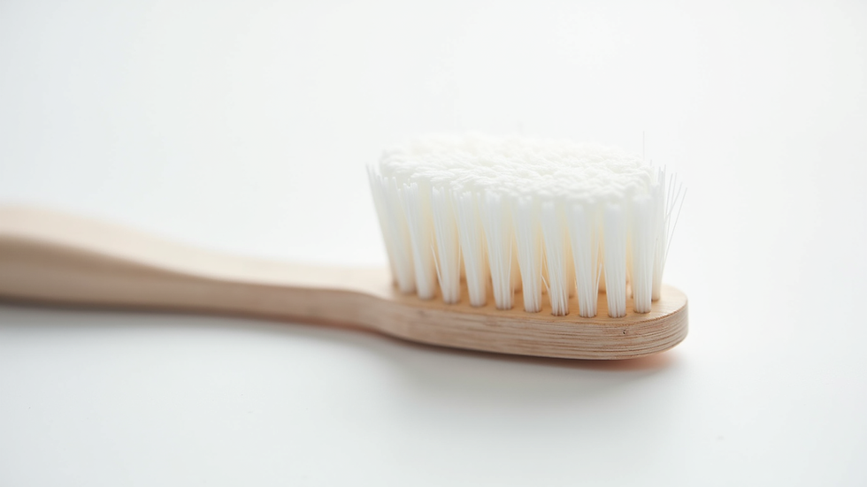 Close-up view of a soft-bristled toothbrush on a white background