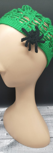 Green spider web hat