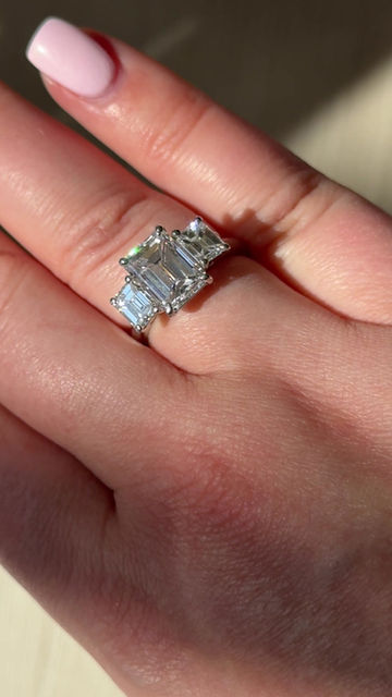 Thumbnail: Platinum Three-Stone Emerald Cut Diamond Ring