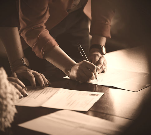 Signing a Contract_edited_edited.jpg