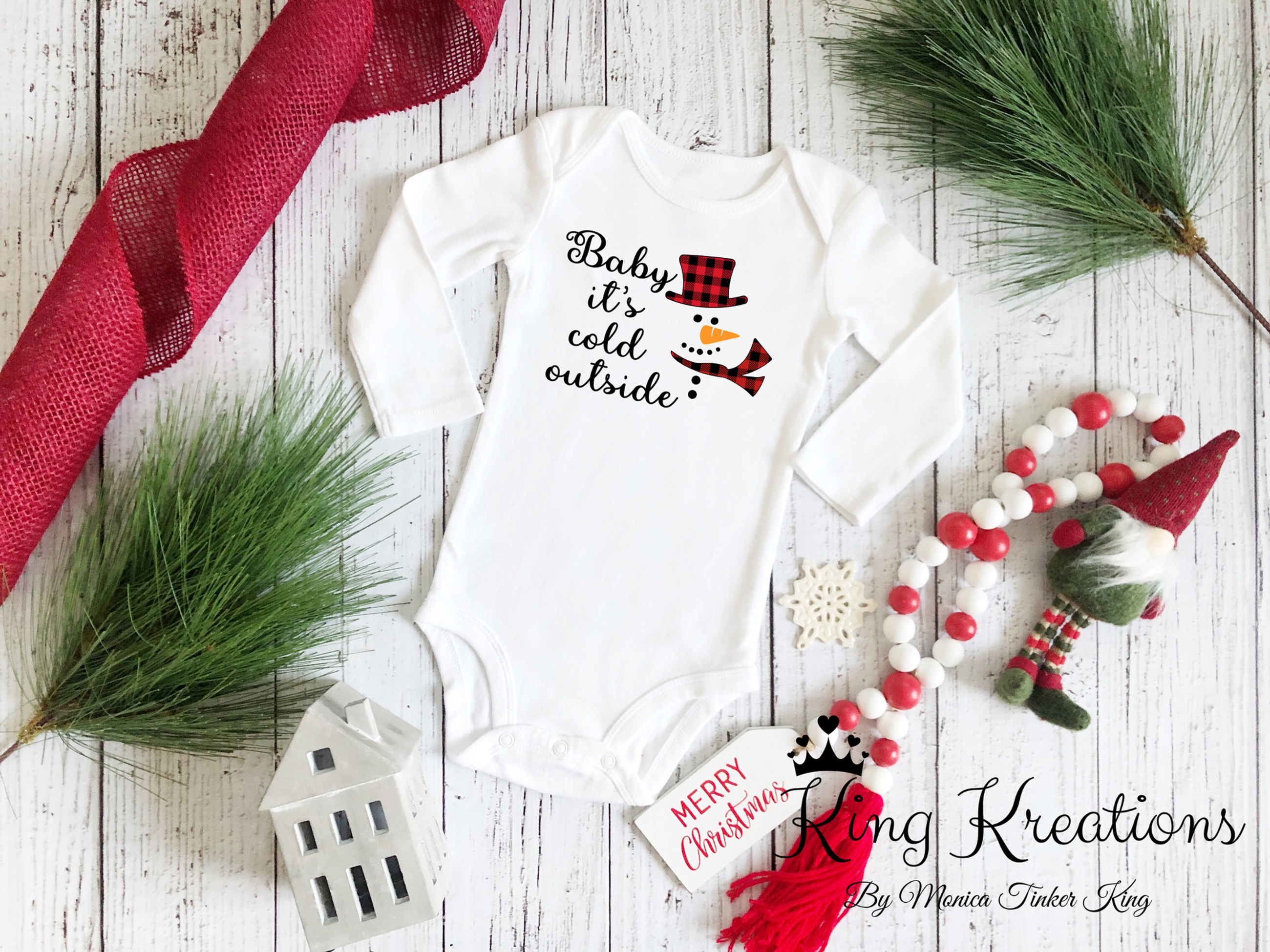 baby it's cold outside christmas baby onesie with a snowman graphic