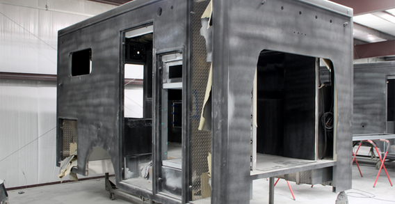 Front curbside corner view of Muskogee #2655 in paint and body prep.