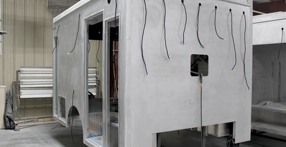 Front curbside corner view of Dooly #2634 in paint and body prep.