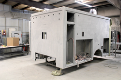 Front driver side corner view of Atlantic #2562 in paint prep