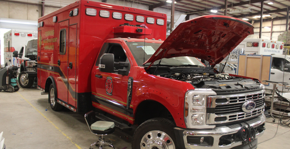 Cushing #2584 front curbside view in electrical. Red Type I ambulance.