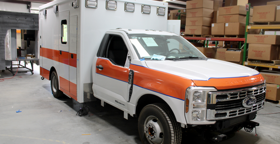 Front curbside view of Washington #2643 getting orange stripe graphics.