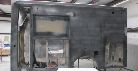 Driver side view of Muskogee #2655 in paint and body prep.
