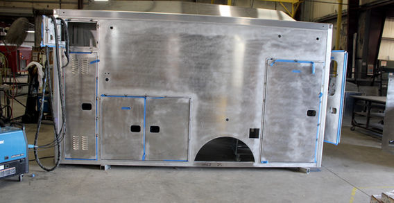 Driver side view of NEFEA #2663 Type I ambulance in beginning welding and fabrication.