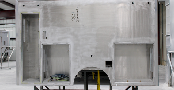 Driver side view of Screvens #2661 in paint and body prep.