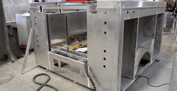 Rear curbside corner view of 9' Quick Attack for Atlanta Airport in welding and fabrication.