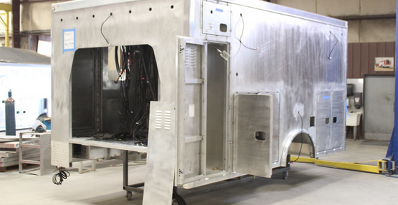 Front driver side corner view of Harrison #2677 in welding and fabrication.