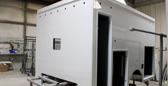 Front driver side corner view of Candler #2635 painted white.