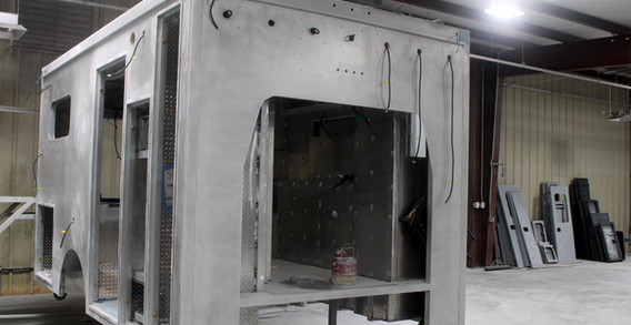 Front curbside corner view of Muskogee #2655 in paint and body prep.