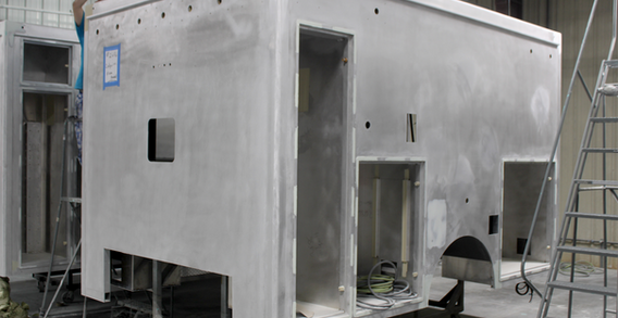 Front driver side corner view of Colquitt #2686 in paint and body prep.
