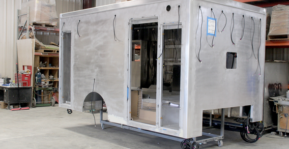 Front curbside corner view of NEFEA #2663 in paint and body prep.