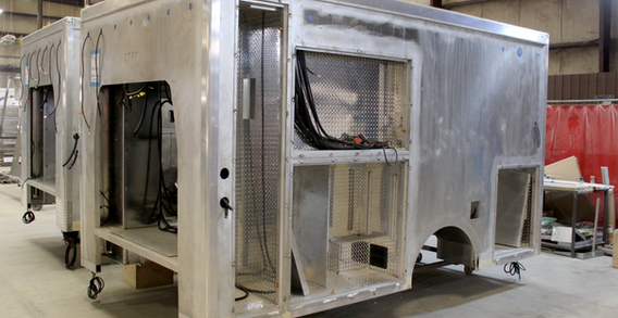 Front driver side corner view of Muskogee #2657 in welding and fabricaiton. Type III ambulance in fabrication.