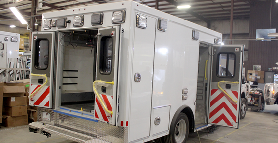 Rear curbside corner view of UNC Health Rex #2640 in box prep.