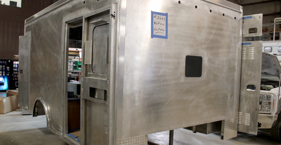 Front curbside view of NEFEA #2625 in welding and fabrication.