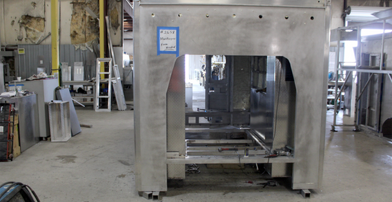 Front wall view of Muskogee #2658 in beginning welding and fabrication. Type III ambulance.