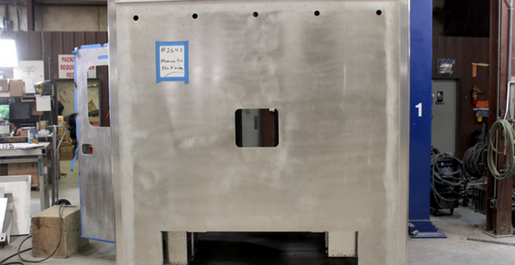 Front wall view of Monroe #2647 on welding and fabrication lift.