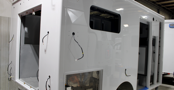 Rear curbside corner view of Muskogee #2653 painted white.