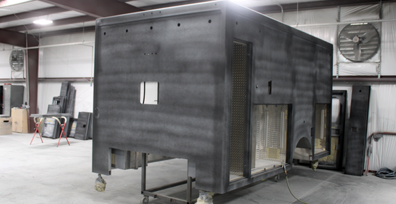 Front driverside corner view of Type I ambulance for Monroe #2647 in paint and body prep.
