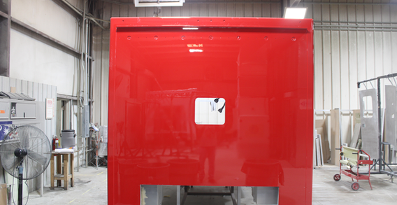 Front wall view of NEFEA #2637 painted white. Red Type I ambulance.
