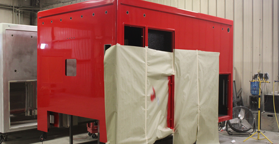 Front driver side corner view of Cushing #2584 in paint.