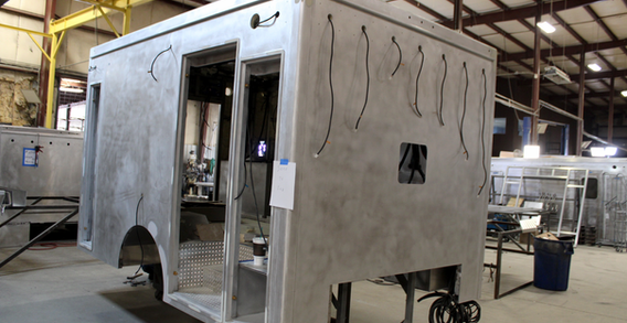 Front curbside corner view of Liberty #2571 in paint and body prep.
