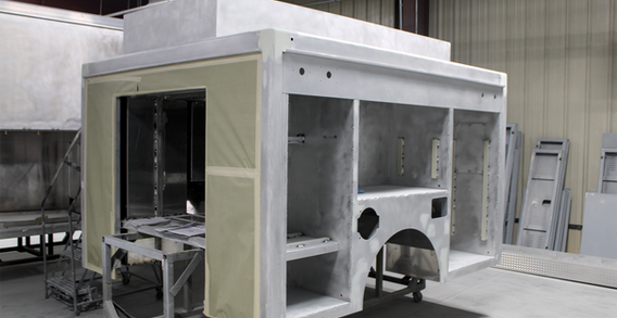 Front driver side corner view of NEFEA #2565 in paint and body prep.