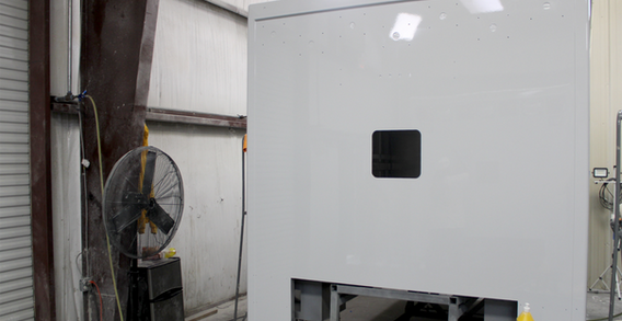 Front wall view of Ware #2578 painted white by Custom Truck and Body Works, Inc.