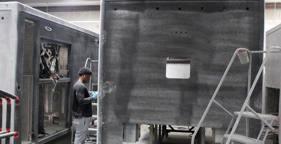 Front wall view of Colquitt #2687 Type I ambulance primed and getting sanded for final paint.