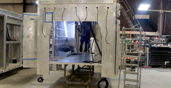 Front wall view of Fire Service #2690 Type III ambulance in welding and fabrication.