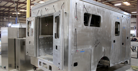 Rear curbside corner view of Muskogee #2653 in welding and fabrication.