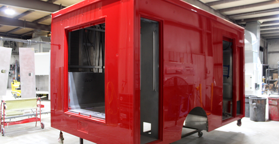 Rear curbside corner view of NEFEA #2637 painted red. Type I Ambulance