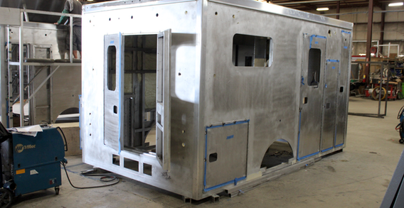 Rear curbside corner view of Muskogee #2658 in welding and fabrication.