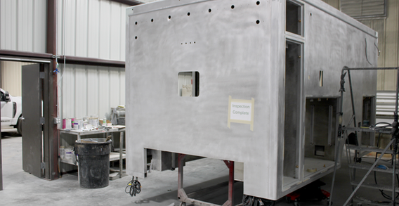 Front driver side corner view of Atlantic #2610 in paint and body prep.