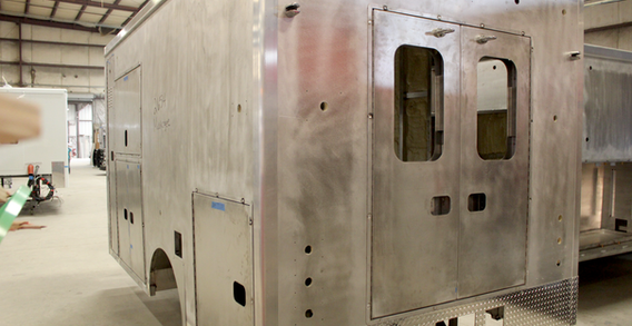 Rear driver side view of Muskogee #2654 in welding and fabrication.