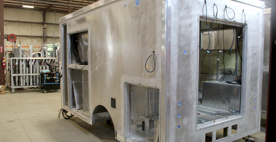 Rear driver side corner view of Muskogee #2657 in welding and fabrication.