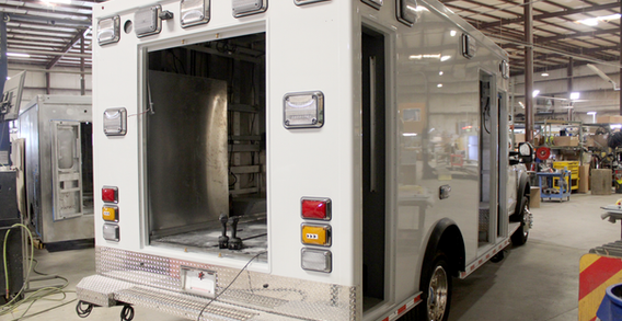 Rear view of Type I ambulance for Fire Service #2689 shown from the rear curbside corner in mount.