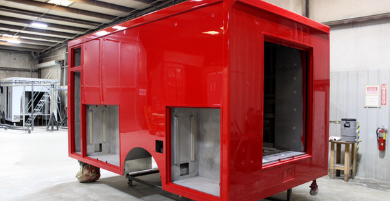 Rear driver side corner view of NEFEA #2637 painted red.
