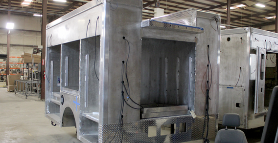 Rear driver side corner view of Atlantic #2617 in welding and fabrication.