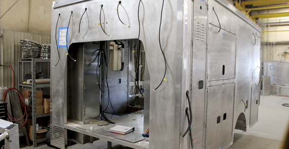 Front driver side corner view of Muskogee #2653 in welding and fabrication.