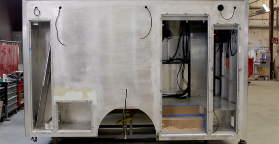 Driver side view of Calhoun #2662 in welding and fabrication.